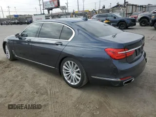 2016 BMW 7 Series 740i with VIN WBA7E2C51GG546677, listed as a Copart auction lot 63455445 with 106,553 mi miles and Salvage title. Bid and sale history available at DreamBid. Image 2.