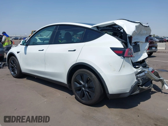 2024 Tesla Model Y with VIN 7SAYGDED8RF201955, listed as a IAAI auction lot 42700483 with 11,898 mi miles and . Bid and sale history available at DreamBid. Image 3.