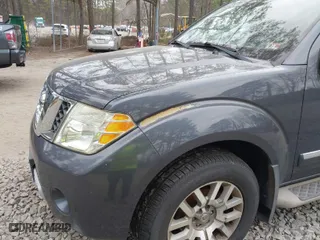 2010 Nissan Pathfinder SE with VIN 5N1AR1NB4AC627788, listed as a IAAI auction lot 41733257 with 130,586 mi miles. Bid and sale history available at carsss.com. Image 6.