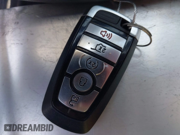 2020 Ford Escape Titanium with VIN 1FMCU9J92LUA27373, listed as a IAAI auction lot 42650077 with 42,179 mi miles and . Bid and sale history available at DreamBid. Image 11.