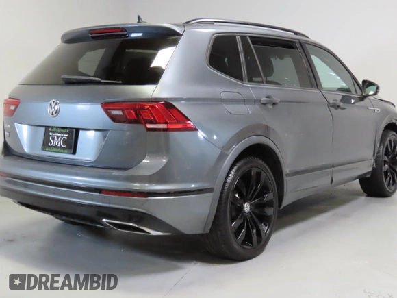 2020 Volkswagen Tiguan SE z VIN 3VV3B7AXXLM154326, wystawiony jako Copart lot #59328395 z przebiegiem 62 793 mil mil oraz Czysty tytuł • Clean title. Historia ofert i sprzedaży dostępna na DreamBid. Obrazek 3.