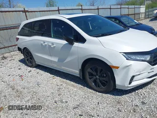 2023 Honda Odyssey Sport z VIN 5FNRL6H73PB022900, wystawiony jako IAAI lot #41977796 z przebiegiem 65 558 mil mil oraz . Historia ofert i sprzedaży dostępna na DreamBid. Obrazek 1.