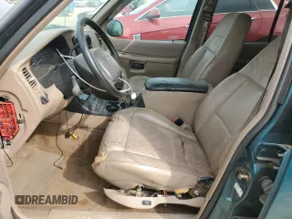 1998 Ford Explorer XL z VIN 1FMZU34E7WZA96759, wystawiony jako Copart lot #47791315 z przebiegiem 138 212 mil mil oraz Czysty tytuł • Clean title. Historia ofert i sprzedaży dostępna na DreamBid. Obrazek 7.