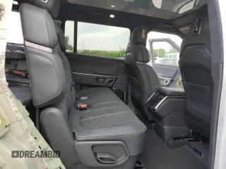 2023 Rivian R1S Adventure z VIN 7PDSGABA7PN021756, wystawiony jako Copart lot #67650414 z przebiegiem 3284 mil mil oraz Szkody całkowita. Historia ofert i sprzedaży dostępna na DreamBid. Obrazek 11.