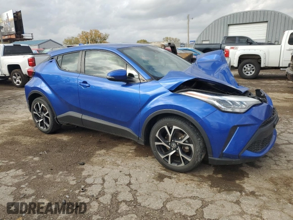 2021 Toyota C-HR LE with VIN JTNKHMBX2M1107890, listed as a Copart auction lot 77992554 with 54,219 mi miles and Salvage Title. Bid and sale history available at carsss.com. Image 4.