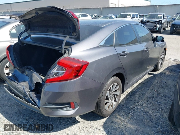 2016 Honda Civic EX with VIN 2HGFC2F74GH550780, listed as a IAAI auction lot 42135678 with 125,005 mi miles and . Bid and sale history available at DreamBid. Image 4.