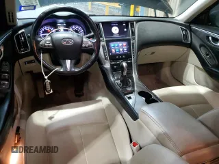 2015 Infiniti Q50 Premium with VIN JN1BV7AP6FM350140, listed as a Copart auction lot 56067465 with 125,241 mi miles and Salvage title. Bid and sale history available at DreamBid. Image 8.