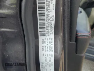 2015 Jeep Cherokee Trailhawk z VIN 1C4PJMBS2FW705132, wystawiony jako Copart lot #59884325 z przebiegiem 100 438 mil mil oraz Szkoda całkowita • Salvage title. Historia ofert i sprzedaży dostępna na DreamBid. Obrazek 13.
