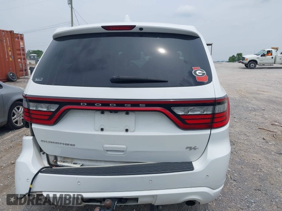 2014 Dodge Durango R/T with VIN 1C4SDHCT5EC590056, listed as a IAAI auction lot 42469695 with 174,356 mi miles and . Bid and sale history available at DreamBid. Image 16.