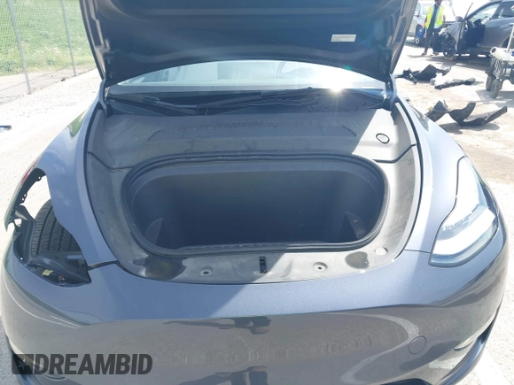 2023 Tesla Model Y Long Range z VIN 7SAYGDEE1PA158661, wystawiony jako IAAI lot #41983897 z przebiegiem 20 176 mil mil oraz . Historia ofert i sprzedaży dostępna na DreamBid. Obrazek 10.
