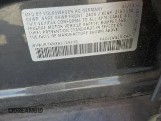 2010 Volkswagen Passat Komfort with VIN WVWJK7ANXAE129739, listed as a Copart auction lot 57798275 with 155,830 mi miles and Salvage title. Bid and sale history available at DreamBid. Image 12.