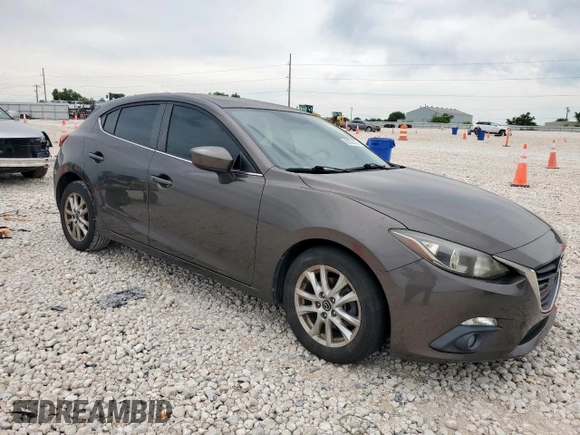 2015 Mazda 3 i Grand Touring with VIN JM1BM1M79F1226521, listed as a Copart auction lot 60328335 with 104,079 mi miles and Salvage title. Bid and sale history available at DreamBid. Image 4.