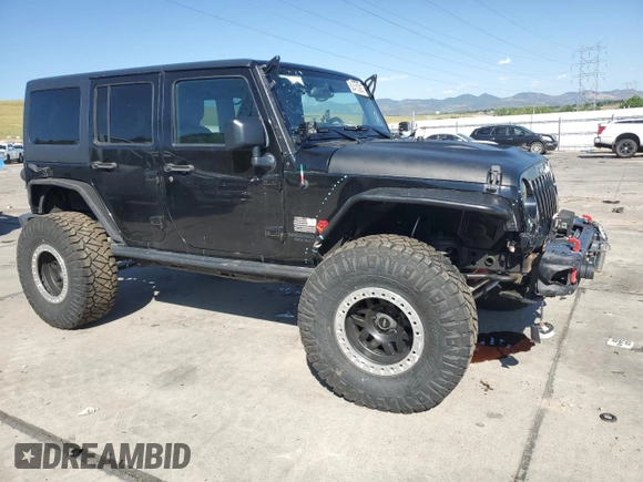 2016 Jeep Wrangler Unlimited Rubicon with VIN 1C4HJWFG3GL155092, listed as a Copart auction lot 62410365 with 82,231 mi miles and Salvage title. Bid and sale history available at DreamBid. Image 4.