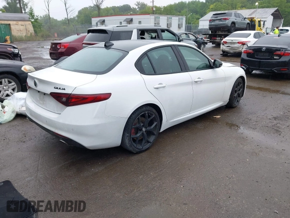 2021 Alfa Romeo Giulia Ti Sport with VIN ZARFAMBN9M7640461, listed as a IAAI auction lot 42329442 with 43,266 mi miles and . Bid and sale history available at DreamBid. Image 4.