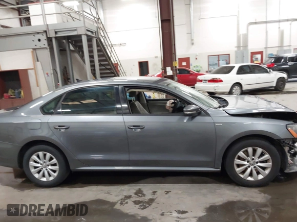 2013 Volkswagen Passat Wolfsburg Edition z VIN 1VWAH7A34DC148507, wystawiony jako IAAI lot #42339068 z przebiegiem 110 593 mil mil oraz . Historia ofert i sprzedaży dostępna na DreamBid. Obrazek 13.