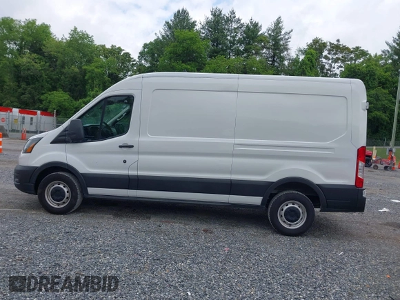 2022 Ford Transit Cargo with VIN 1FTBR1C85NKA74578, listed as a IAAI auction lot 42316744 with 63,376 mi miles and . Bid and sale history available at DreamBid. Image 14.