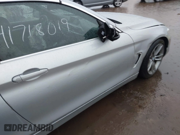 2014 BMW 4 Series 428i with VIN WBA3V5C51EJ968657, listed as a IAAI auction lot 41718019 with 111,083 mi miles and . Bid and sale history available at DreamBid. Image 6.