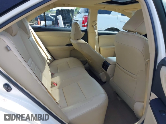 2015 Toyota Camry XLE with VIN 4T1BF1FK1FU977554, listed as a IAAI auction lot 42083589 with 104,811 mi miles and . Bid and sale history available at DreamBid. Image 8.