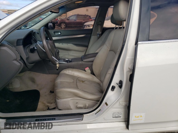 2015 Infiniti Q40 with VIN JN1CV6AR7FM521252, listed as a Copart auction lot 79917614 with 141,761 mi miles and Salvage Title. Bid and sale history available at DreamBid. Image 7.