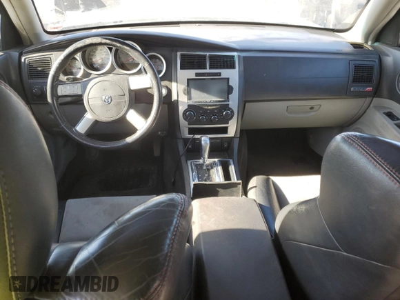 2006 Dodge Charger SRT-8 with VIN 2B3KA73W76H421802, listed as a Copart auction lot 83709404 with Not Provided miles and Salvage Title. Bid and sale history available at DreamBid. Image 8.