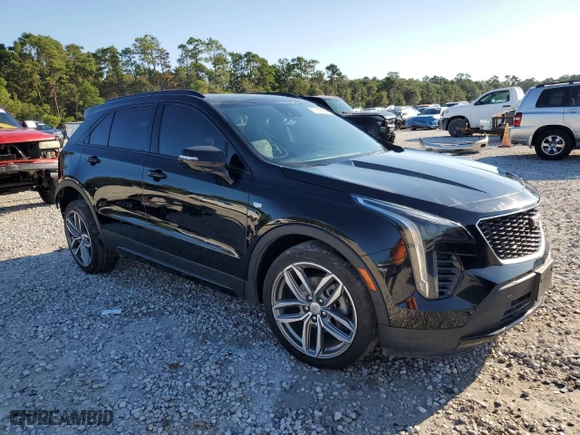 2020 Cadillac XT4 FWD Sport with VIN 1GYFZER47LF110574, listed as a Copart auction lot 73149484 with 56,986 mi miles and Clean Title. Bid and sale history available at carsss.com. Image 4.