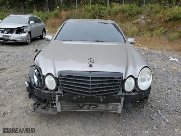 2004 Mercedes-Benz E-Class AMG with VIN WDBUF76J14A457004, listed as a Copart auction lot 71358894 with 154,635 mi miles and Salvage Title. Bid and sale history available at carsss.com. Image 5.