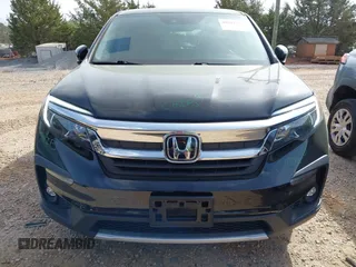 2021 Honda Pilot EX-L with VIN 5FNYF6H57MB064595, listed as a IAAI auction lot 41942327 with 46,150 mi miles and . Bid and sale history available at DreamBid. Image 6.