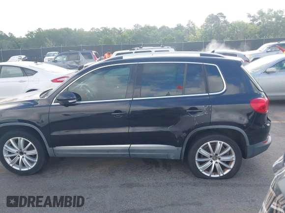 2012 Volkswagen Tiguan SE z VIN WVGAV7AX7CW504391, wystawiony jako IAAI lot #42240604 z przebiegiem 180 330 mil mil oraz . Historia ofert i sprzedaży dostępna na DreamBid. Obrazek 14.