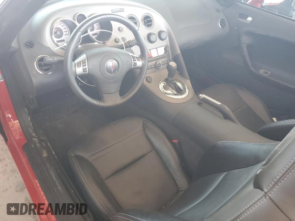2008 Pontiac Solstice z VIN 1G2MC35B48Y131700, wystawiony jako Copart lot #50033395 z przebiegiem 4 783 mil mil oraz Szkoda całkowita • Salvage title. Historia ofert i sprzedaży dostępna na DreamBid. Obrazek 8.