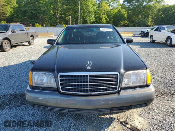 1992 Mercedes-Benz 300 with VIN WDBGB34E8NA061712, listed as a Copart auction lot 55837085 with 219,090 mi miles and Clean Title. Bid and sale history available at DreamBid. Image 5.