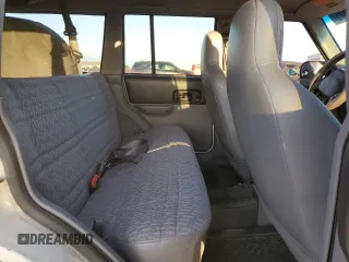 1997 Jeep Cherokee Sport z VIN 1J4FJ68S9VL594832, wystawiony jako Copart lot #53081675 z przebiegiem 167 028 mil mil oraz Czysty tytuł • Clean title. Historia ofert i sprzedaży dostępna na DreamBid. Obrazek 11.