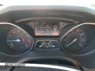 2017 Ford Focus Titanium with VIN 1FADP3N21HL279810, listed as a Copart auction lot 57950195 with 121,139 mi miles and Salvage title. Bid and sale history available at DreamBid. Image 9.