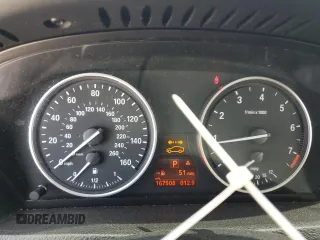 2012 BMW X5 35i с VIN 5UXZV4C58CL987049, выставлен на аукционе Copart как лот 61013925 с пробегом 167 508 миль миль и Чистый • Clean title. История ставок и продаж доступна на DreamBid. Изображение 9.