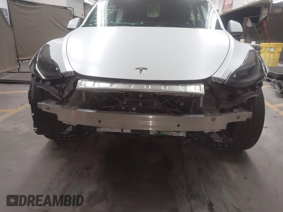 2023 Tesla Model Y Performance with VIN 7SAYGDEF5PF665560, listed as a IAAI auction lot 41809349 with Not Provided miles and . Bid and sale history available at DreamBid. Image 6.