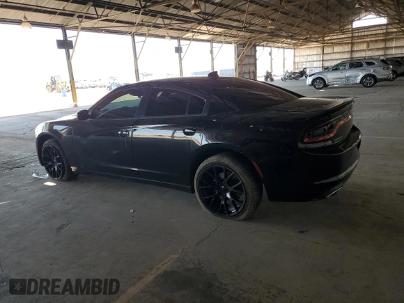 2015 Dodge Charger SXT with VIN 2C3CDXJG9FH748809, listed as a Copart auction lot 61682335 with 128,252 mi miles and Salvage title. Bid and sale history available at DreamBid. Image 2.