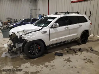 2014 Jeep Grand Cherokee Summit with VIN 1C4RJFJT7EC106290, listed as a Copart auction lot 52001295 with 137,266 mi miles and Non Repairable. Bid and sale history available at carsss.com. Image 1.