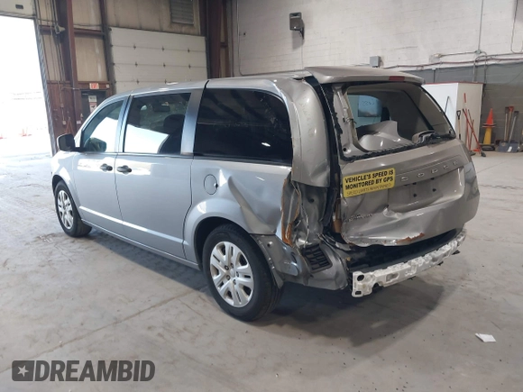 2019 Dodge Grand Caravan SE with VIN 2C4RDGBG3KR571537, listed as a IAAI auction lot 42036875 with 95,190 mi miles and . Bid and sale history available at DreamBid. Image 3.
