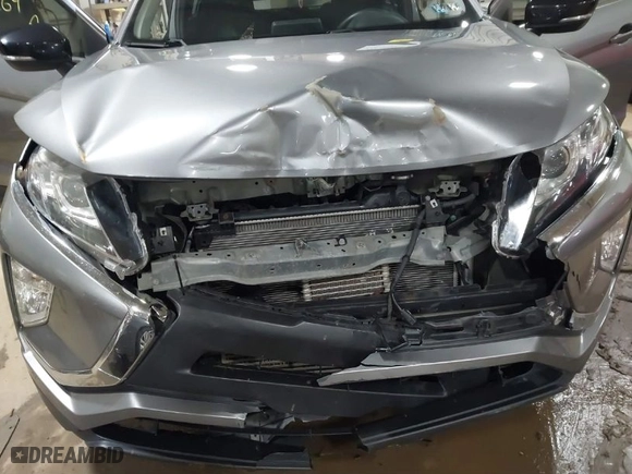 2018 Mitsubishi Eclipse Cross LE with VIN JA4AT4AA7JZ056860, listed as a IAAI auction lot 41606264 with 65,710 mi miles. Bid and sale history available at carsss.com. Image 6.