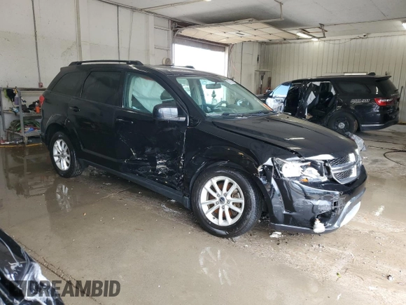 2015 Dodge Journey SXT with VIN 3C4PDDBG7FT646152, listed as a Copart auction lot 58371505 with 143,759 mi miles and Salvage title. Bid and sale history available at DreamBid. Image 4.
