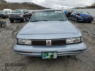 1994 Oldsmobile Cutlass Ciera S z VIN 1G3AG55M1R6362731, wystawiony jako Copart lot #83832424 z przebiegiem 145 973 mil mil oraz Szkody całkowita. Historia ofert i sprzedaży dostępna na DreamBid. Obrazek 5.