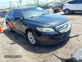 2011 Ford Taurus SEL with VIN 1FAHP2EW6BG127102, listed as a IAAI auction lot 42131123 with 168,965 mi miles. Bid and sale history available at carsss.com. Image 1.