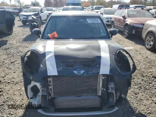2018 MINI Hardtop 4 Door Cooper S with VIN WMWXU3C53J2F50052, listed as a Copart auction lot 77529294 with 105,048 mi miles and Salvage title. Bid and sale history available at DreamBid. Image 5.