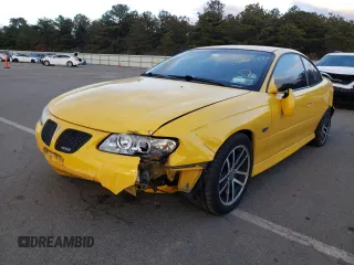 2004 Pontiac GTO z VIN 6G2VX12G74L214271, wystawiony jako Copart lot #61397074 z przebiegiem 106 994 mil mil oraz Nie do naprawy. Historia ofert i sprzedaży dostępna na DreamBid. Obrazek 2.