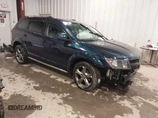 2014 Dodge Journey Crossroad with VIN 3C4PDDGG4ET302527, listed as a IAAI auction lot 41351441 with 137,260 mi miles and . Bid and sale history available at DreamBid. Image 1.