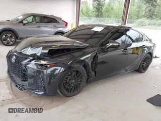 2023 Lexus IS 500 F Sport Performance z VIN JTHAP1D22P5003981, wystawiony jako IAAI lot #42262101 z przebiegiem 13 479 mil mil oraz . Historia ofert i sprzedaży dostępna na DreamBid. Obrazek 2.