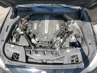 2014 BMW 5 Series GT 550i xDrive with VIN WBA5M0C5XED084908, listed as a Copart auction lot 50619945 with 97,680 mi miles and Salvage Title. Bid and sale history available at carsss.com. Image 12.