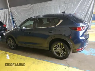 2021 Mazda CX-5 Touring with VIN JM3KFACMXM0334139, listed as a Copart auction lot 55362905 with 117,279 mi miles and Clean Title. Bid and sale history available at DreamBid. Image 2.