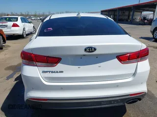 2017 Kia Optima LX with VIN 5XXGT4L31HG170655, listed as a IAAI auction lot 41850725 with 113,619 mi miles. Bid and sale history available at carsss.com. Image 16.