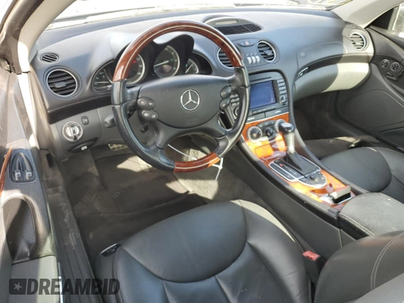 2005 Mercedes-Benz SL 500 with VIN WDBSK75F95F100318, listed as a Copart auction lot 50427245 with 80,320 mi miles and Salvage Title. Bid and sale history available at DreamBid. Image 8.