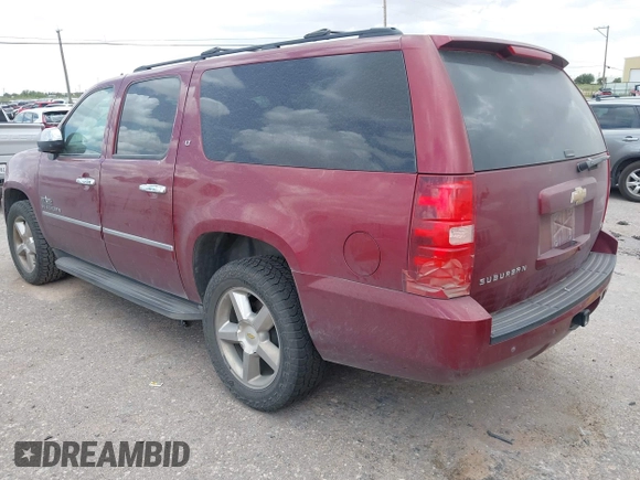 2011 Chevrolet Suburban LT with VIN 1GNSCJE0XBR355603, listed as a IAAI auction lot 42555932 with 240,213 mi miles and . Bid and sale history available at DreamBid. Image 3.